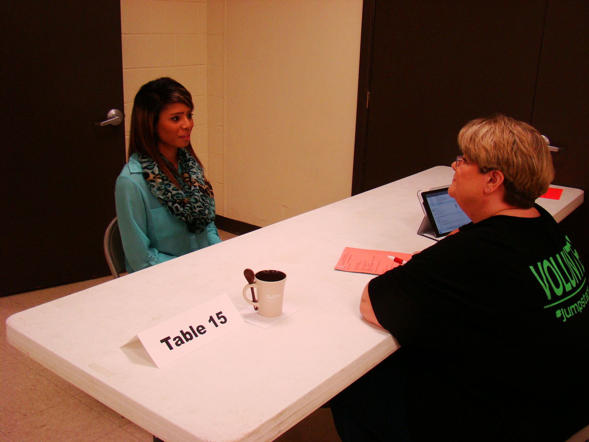 Employer conducts mock interview with student.